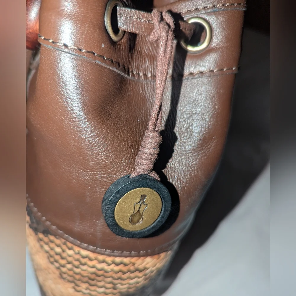 The Sak Brown Weave and Leather Backpack.